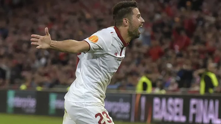 Coke celebrando un gol en un partido del Sevilla. | Imagen: página web Sevilla FC.